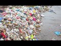 Uncollected Garbage on the Street. Free Stock Footage. 4K