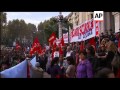 Strikers march to protest government spending cuts