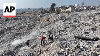 Displaced and freed Syrians return home but struggle to find their houses under rubble