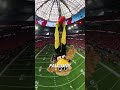 freddie falcon the mascot flying