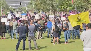 LAPD officers take part in protest while in uniform