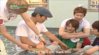 Minwoo shows his thankfulness towards his savior Youngmin :P