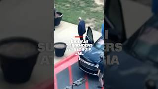 Giuliani surrenders at Georgia jail