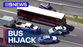 Hijacked bus sparks chase through US suburbs | 9 News Australia