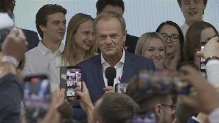 Poland's Civic Coalition party react as tipped to win majority at parliamentary elections | AFP