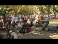 Migrants wait in transit in Belgrade park