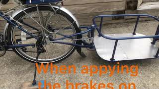 Bicycle trailer surge brakes