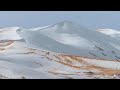 Snow falls in the Sahara Desert