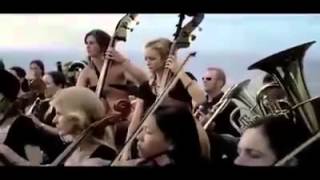 Orchestral musicians play in the middle of the sea and bring whales to surface!