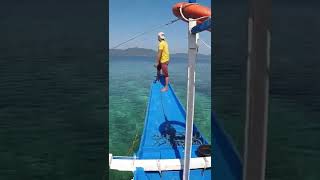 YOUNG FILIPINA GIRL ISLAND HOPPING IN PORT BARTON PALAWAN, PHILIPPINES