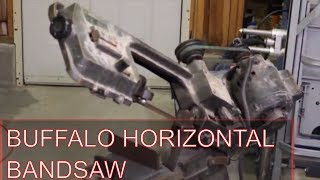 A Buffalo horizontal bandsaw, my first blacksmith hammer and...