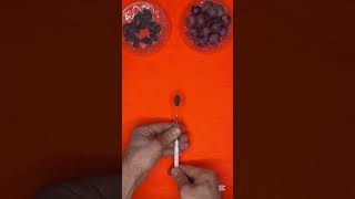 “Syringe Magic: Turning a Small Raisin into a Big Grape!” #asmr #magic #syringe #raisin #grape