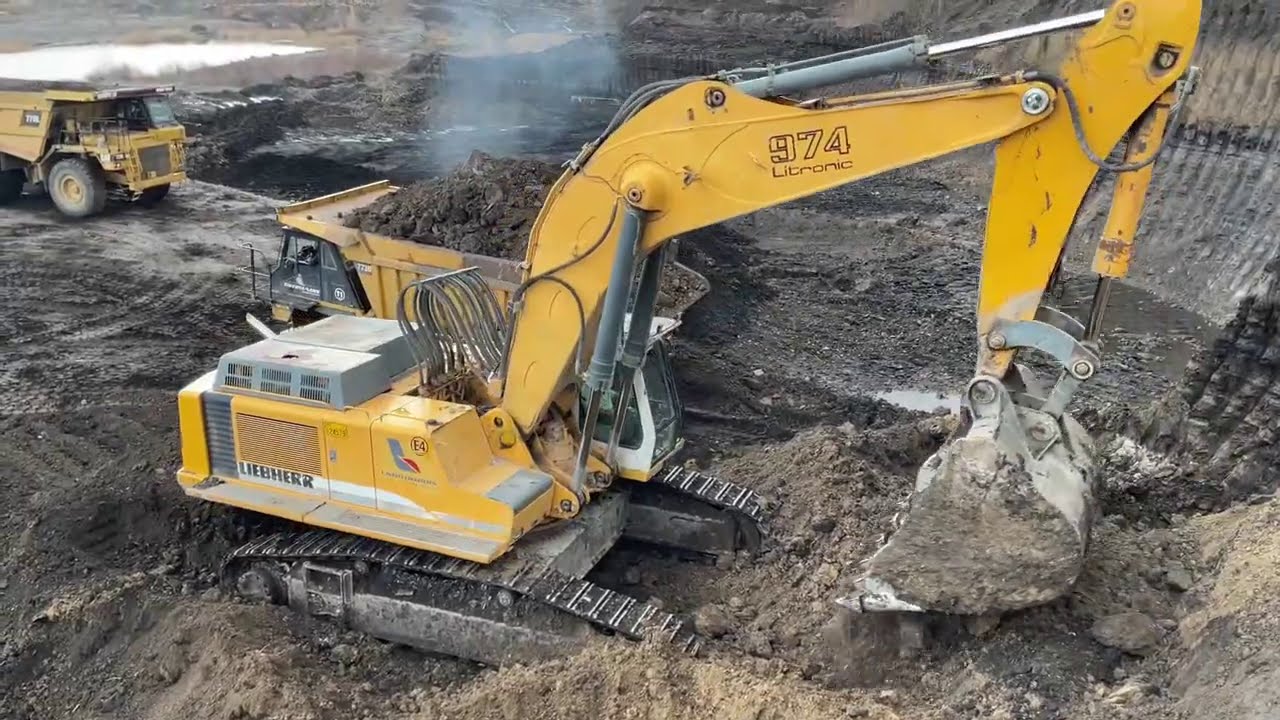 Liebherr 974 Excavator Loading Caterpillar Dumpers - Sotiriadis ...