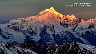 Golden peaks of Meili Snow Mountain dazzle in the sunrise in SW China