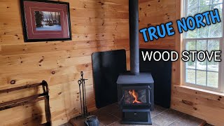 Installing a new wood stove in our off grid cabin.