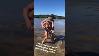 Chris Hemsworth and Elsa Pataky riding each others while finding yabbies