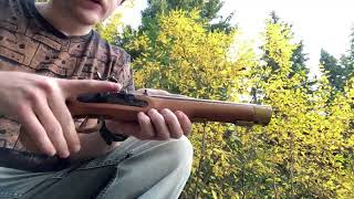 Removing a cleaning brush from the barrel of a muzzleloader