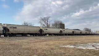 UP 6572 leads a loaded NS grain train eastbound through Fostoria OH. 3/8/2021