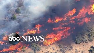 Heat wave stokes fears of raging wildfires in the West