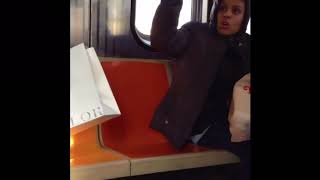 Homeless latina Lady on the NYC Subway E Train going crazy
