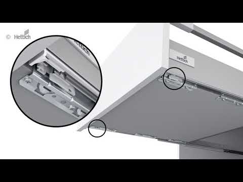 How do you open a Hettich drawer?