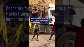 Desperate Palestinians Flock to Aid Trucks Amid Gaza Conflict