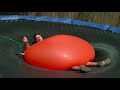 Crushed by a Giant 6ft Water Balloon - The Slow Mo Guys 4K