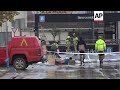 members of spain s military emergency unit at flooded car park under valencia shopping centre