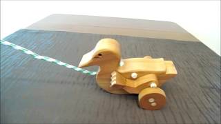 duck animated wood pull toy