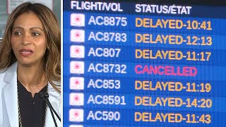 Camera pan shows delays at Toronto's Pearson Airport during service improvement announcement