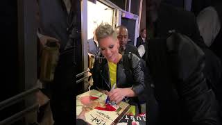 ￼ Pink signing autographs, leaving the Empire State building New York City