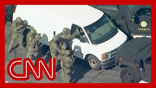 Police search van after 10 people were killed in California massacre