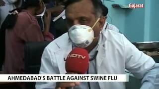 Scenes from a swine flu battle zone. Doctors at frontline