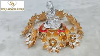 Siri jewellers silver loutes flowers with gold polish... looks it's very beautiful...