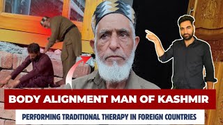 70 year Old Kashmiri Man Performing Old Traditional Therapy For Body Alignment in Foreign Country.