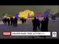 Snow, cold can't keep crowd away from Draper tree-lighting ceremony