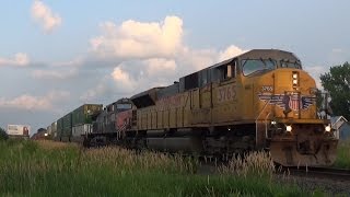 UP SD9043MAC #3765 and SP AC4400CW #6419 on a mixed freight in Annandale, MN