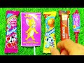 asmr most popular candys some lots of colorful rainbow lollipop candy unpacking chocolate eat