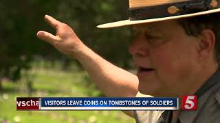 Learn What Coins Left On Soldiers' Tombstones Mean