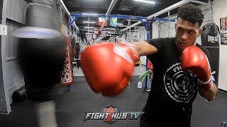 DAVID BENAVIDEZ PRACTICING FAST 6 PUNCH COMBINATIONS ON THE DOUBLE ENG BAG