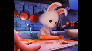 Rabbit cuts living carrots with a knife