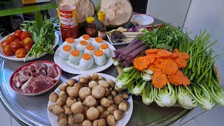 Lẩu hột vịt lộn nước dừa chua cay hấp dẫn.