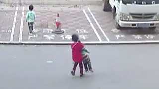 Seven-year-old boy rescues kid hit by tricycle in south China