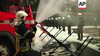 Firemen block traffic during protest against budget cuts