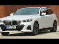 new 2025 bmw 530e touring mineral white plug in hybrid driving exterior and interior