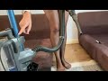 Vacuuming The Sofa Crevice Tools and Upholstery Tool