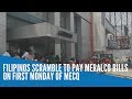 Filipinos scramble to pay Meralco bills on first Monday of MECQ