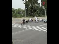 Bikers help grandma cross the road