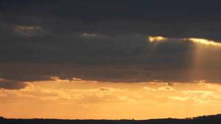 Sunbeams And Clouds .