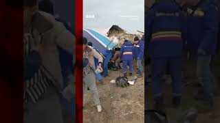 Warning: Upsetting scenes Kazakhstan crash survivors walk away from plane wreckage #bbcnews #shorts